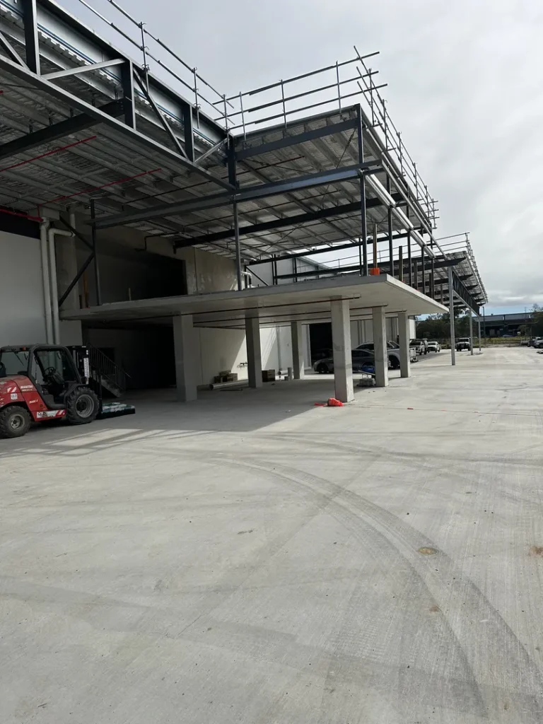 Construction site with scaffolding and machinery